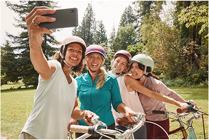 Bridget taking photo with friends