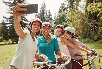 Bridget taking photo with friends